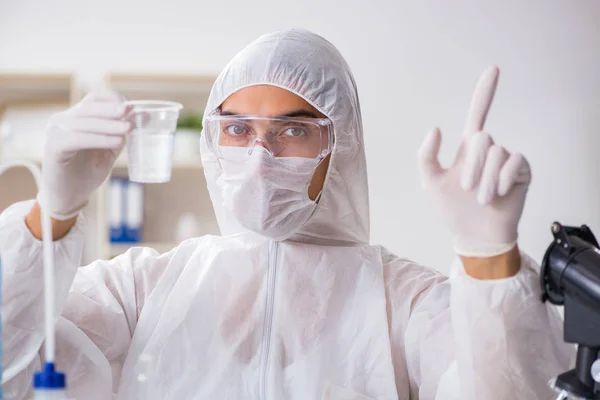 Lab assistant testing water quality