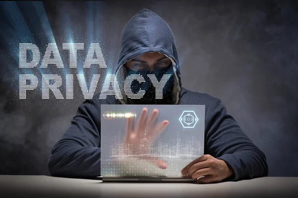 Data privacy concept with hacker stealing personal information