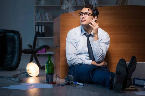 Stressed businessman working overtime in depression — Stock Photo, Image