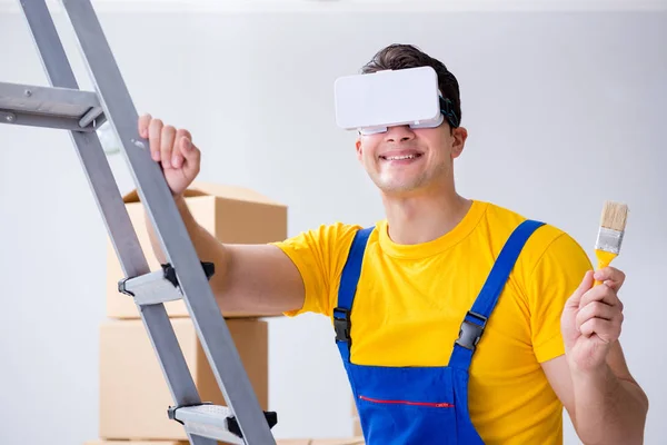 Painter contractor working with virtual reality goggles — Stock Photo, Image
