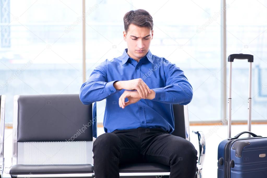 Man wairing to boarding in airport lounge room