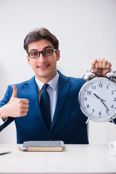 Businessman employee in urgency and deadline concept with alarm — Stock Photo, Image