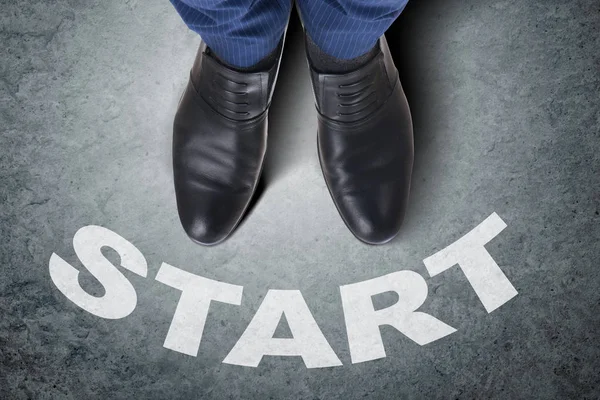 Businessman in start concept with shoes — Stock Photo, Image