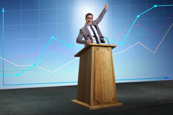 Man zakenman maakt toespraak op rostrum in business concept — Stockfoto