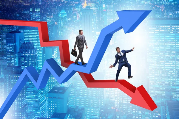 Opposite growth and decliine charts with businessman — Stock Photo, Image