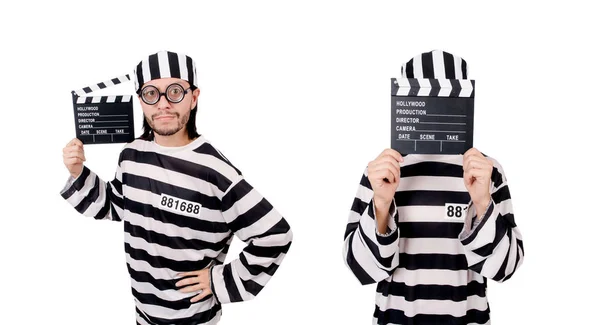 Funny prison inmate with movie board isolated on white — Stock Photo, Image