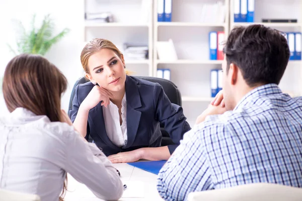 Young family filing divorce papers with lawyer — Stock Photo, Image