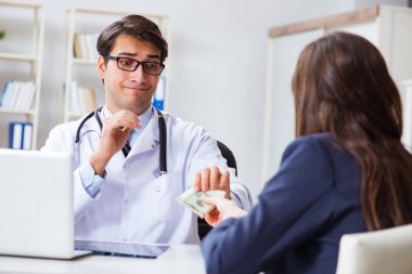 Rüşvet teklif edilen yolsuzluk konsepti doktoru.