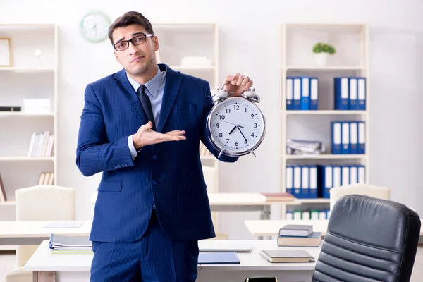 Businessman struggling to meet deadline