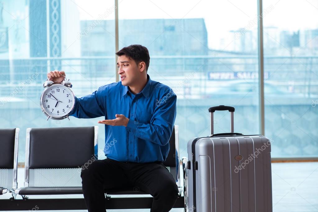 Man wairing to boarding in airport lounge room