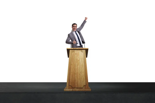Geschäftsmann hält Rede am Rednerpult in Geschäftskonzept — Stockfoto