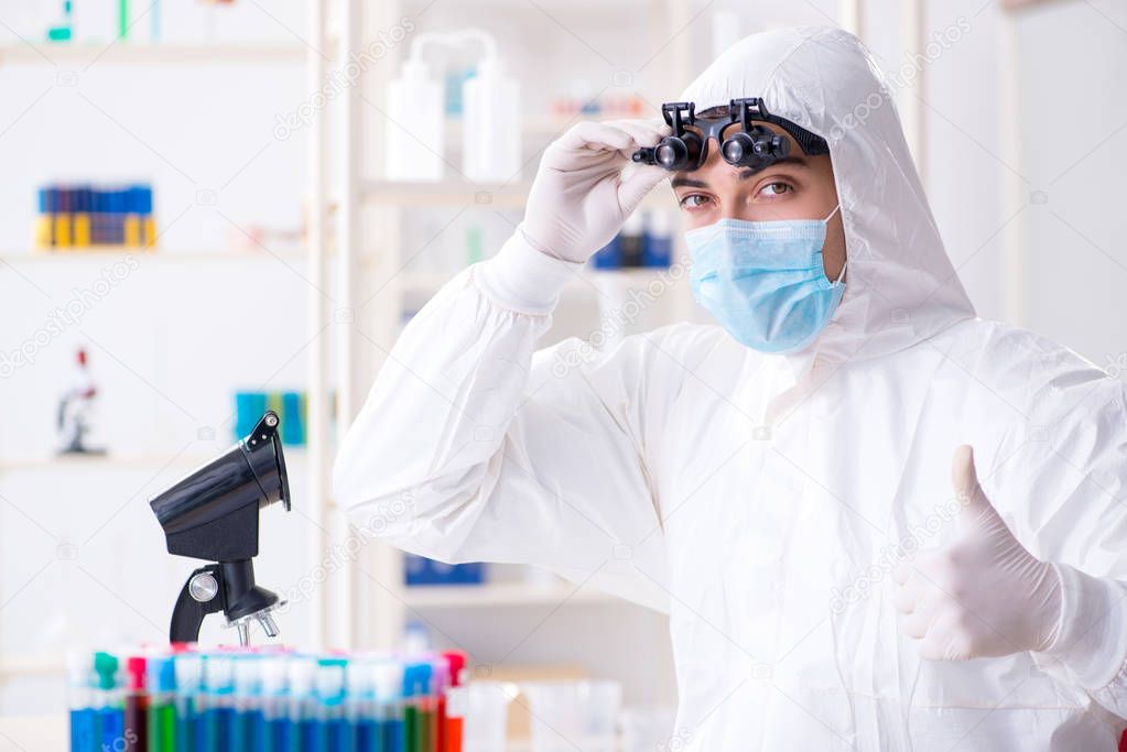 Young chemical scientist working in lab