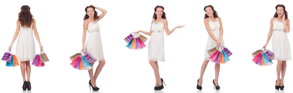 Set di donna con shopping bags su bianco — Foto Stock