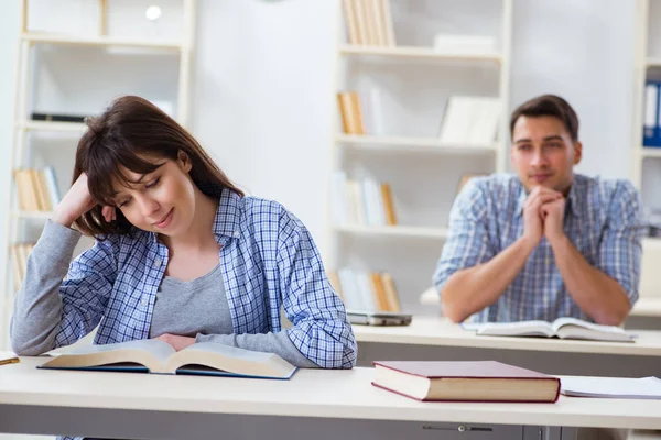 Students sitting and studying in classroom college — Stock Photo, Image