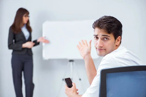 Business presentation in the office with man and woman — Stock Photo, Image