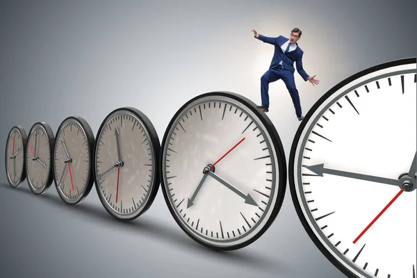 Businessman in time management concept — Stock Photo, Image