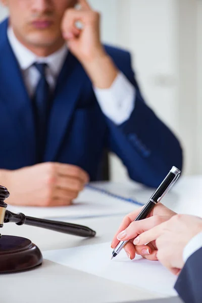 Lawyer talking to his client in office — Stock Photo, Image