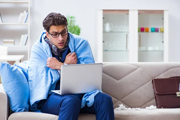 Sick businessman working from home due to flu sickness — Stock Photo, Image