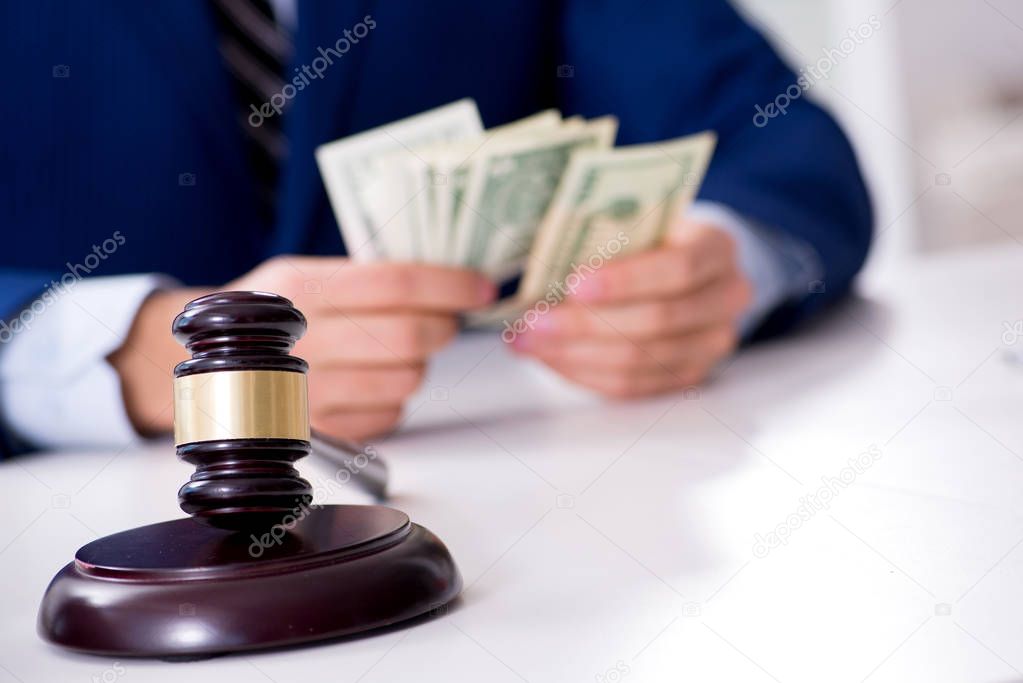 Lawyer receiving money as bribe