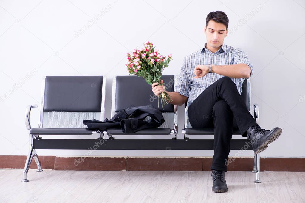 Happy dad waiting for news in maternity house