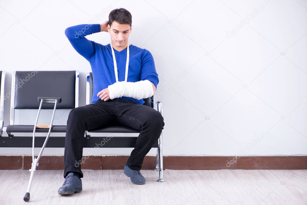 Desperate man waiting for his appointment in hospital with broke