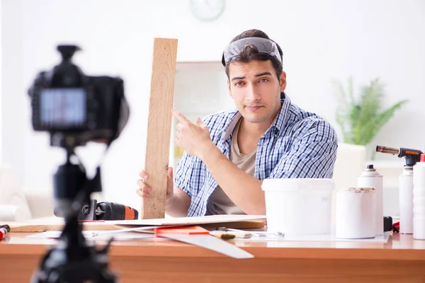 DIY blogger recording video of woorworking hobby
