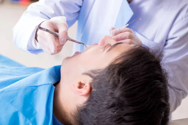 Patient visiting dentist for regular check-up and filling — Stock Photo, Image