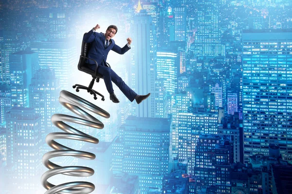 Businessman jumping from spring in promotion concept — Stock Photo, Image