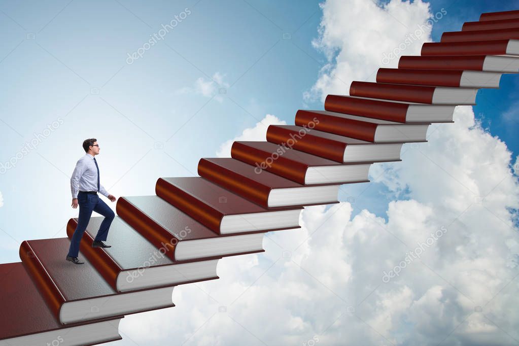 Businessman student climbing the ladder of education books