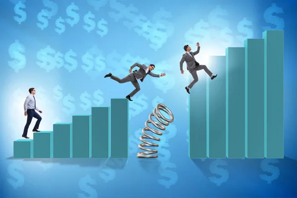 Business people jumping over bar charts — Stock Photo, Image