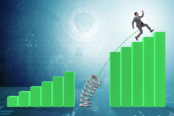 Business people jumping over bar charts — Stock Photo, Image