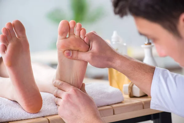 Foot massage in medical spa