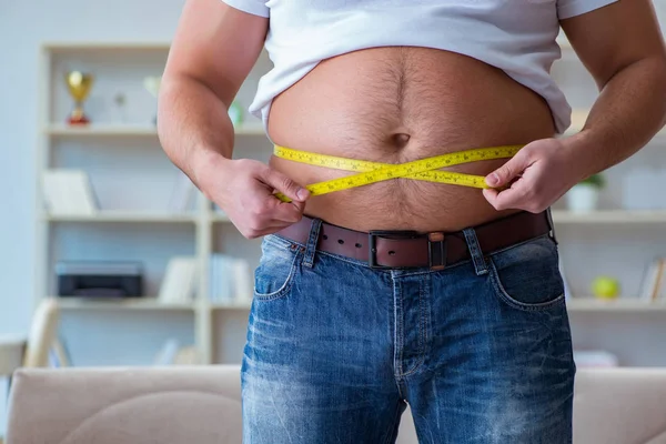 Homem obeso gordo no conceito de dieta — Fotografia de Stock