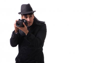 Kameralı casus beyaza izole edilmiş fotoğraflar çekiyor.