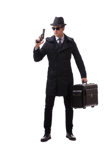 Человек шпион с пистолетом изолированы на белом фоне — стоковое фото