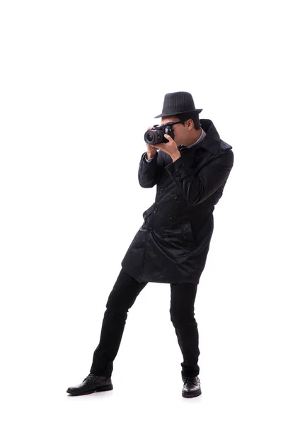 Spy with camera taking pictures isolated on white — Stock Photo, Image