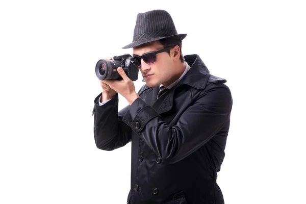 Spy with camera taking pictures isolated on white — Stock Photo, Image