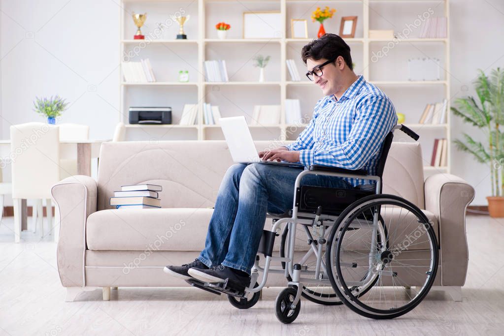 Young student on wheelchair in disability concept