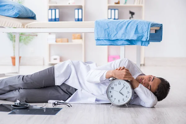 Sleepy doctor tired after long night shift — Stock Photo, Image