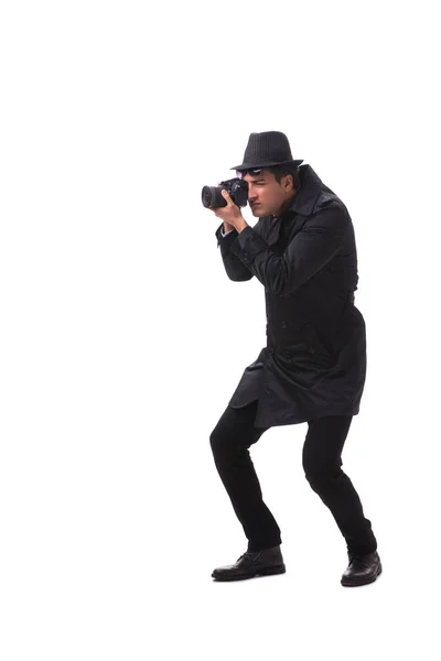 Espião com câmera tirando fotos isoladas no branco — Fotografia de Stock