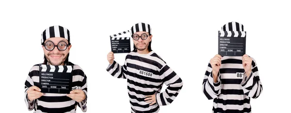 Funny prison inmate with movie board isolated on white — Stock Photo, Image