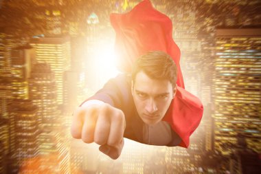 Şehrin üzerinde uçan süper kahraman 