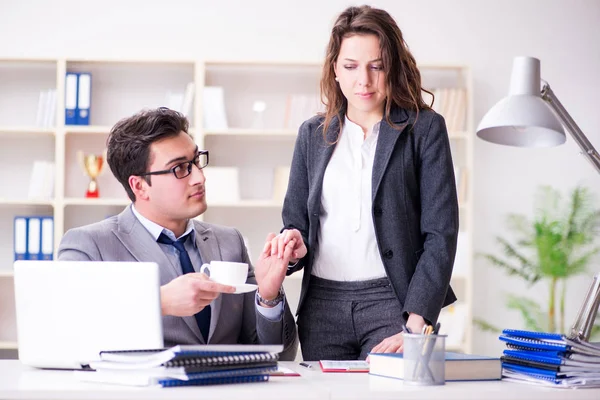 Sexual harassment concept with man and woman in office — Stock Photo, Image