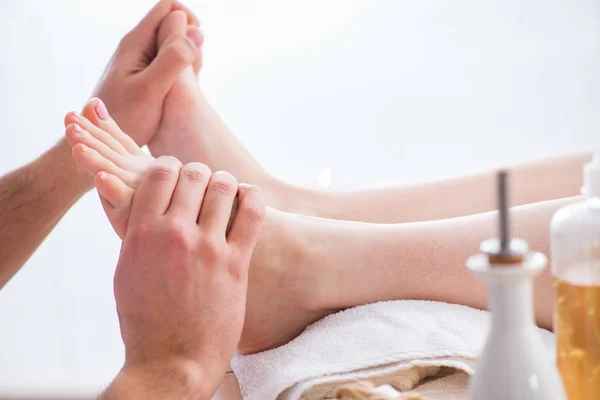 Foot massage in medical spa