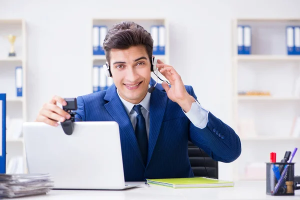 Young help desk operator working in office