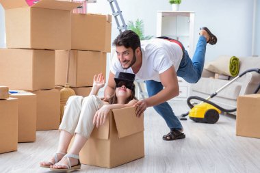 Young family moving to new apartment clipart