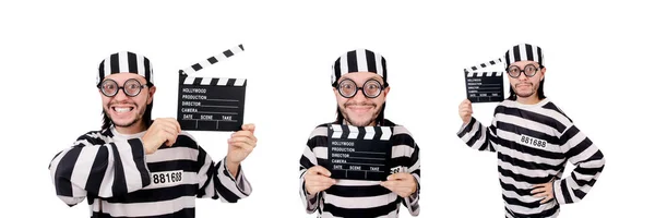 Funny prison inmate with movie board isolated on white — Stock Photo, Image