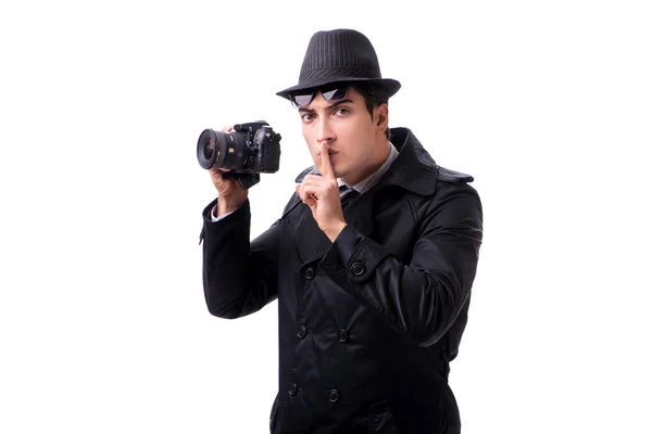 Spy with camera taking pictures isolated on white — Stock Photo, Image