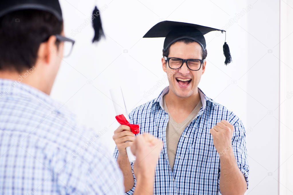 Young student planning graduation speech in front of mirror