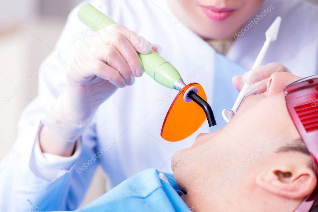 Patient visiting dentist for regular check-up and filling